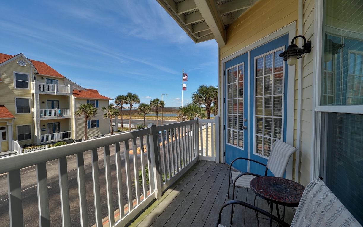 Step onto your private balcony and breathe in the coastal air while enjoying comfortable seating with waterfront views.
