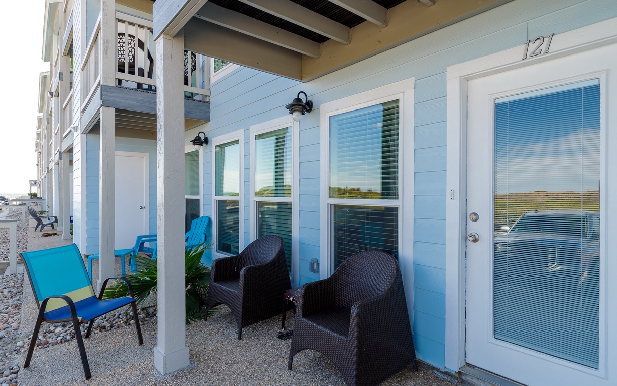 Relax on your private patio with comfortable seating and peaceful views of the surrounding landscape.