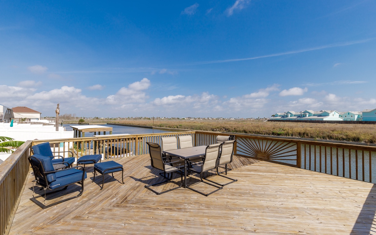 Step onto your private deck and breathe in the salt air as you sip morning coffee surrounded by coastal marshland views.