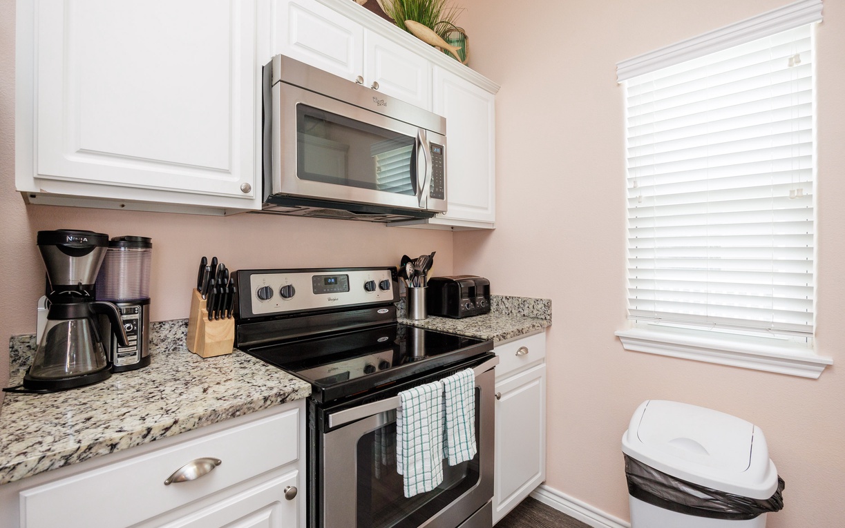 Your fully equipped kitchen features granite counters, stainless appliances, and everything you need to create delicious meals during your stay.
