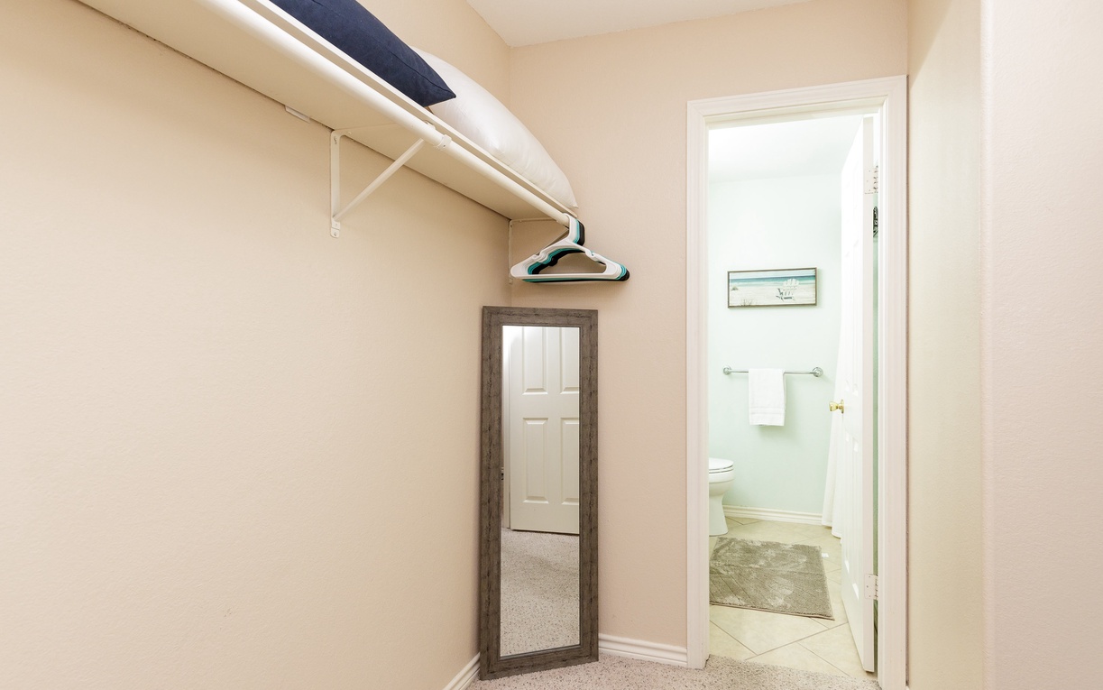 Your spacious room features a convenient ironing station and wardrobe space, with your private bathroom just steps away for ultimate comfort.