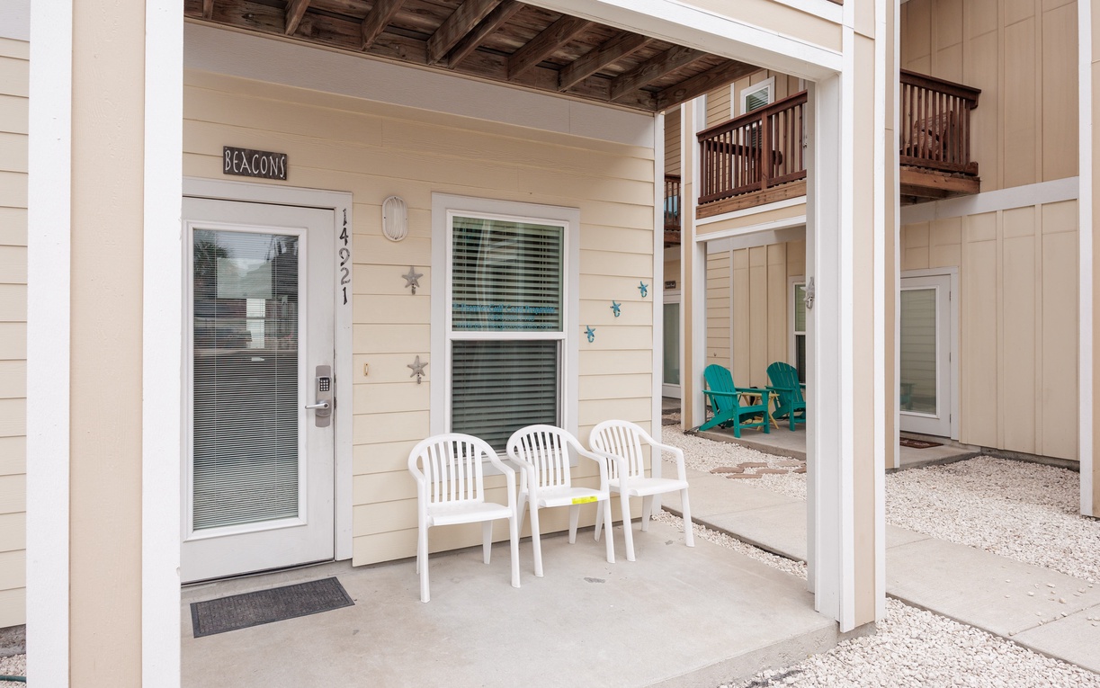 Your private patio welcomes you with comfortable seating where you can unwind and enjoy the coastal breeze.