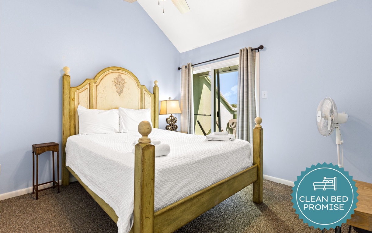 Rest peacefully in your charming bedroom with traditional furnishings, vaulted ceilings, and a private balcony to enjoy morning coffee.