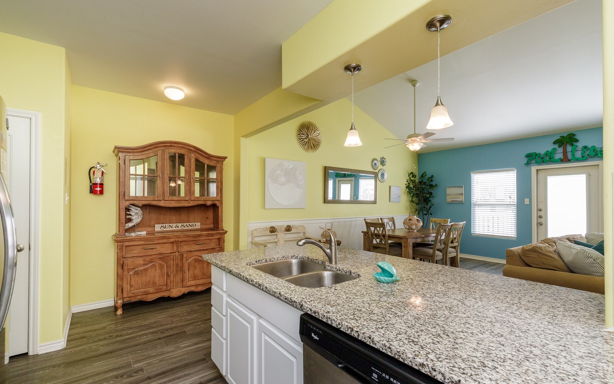 Your spacious kitchen flows seamlessly into the dining and living areas, creating the perfect space for memorable meals together.