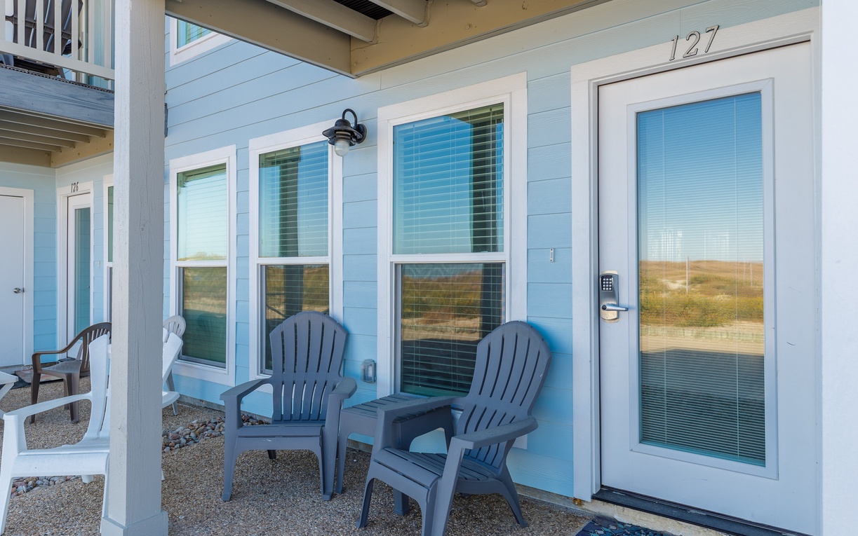 Step onto your private patio where comfortable Adirondack chairs await your morning coffee moments.