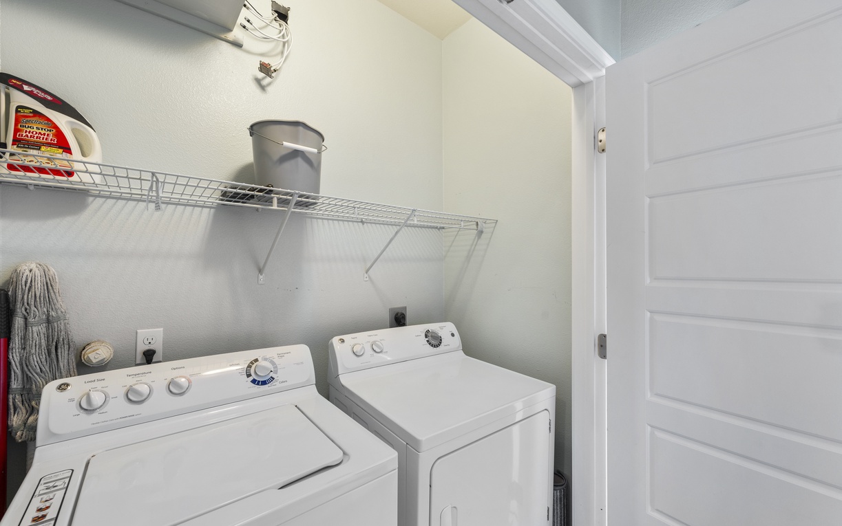 Your private laundry room features full-size washer and dryer with convenient storage shelving for all your vacation essentials.