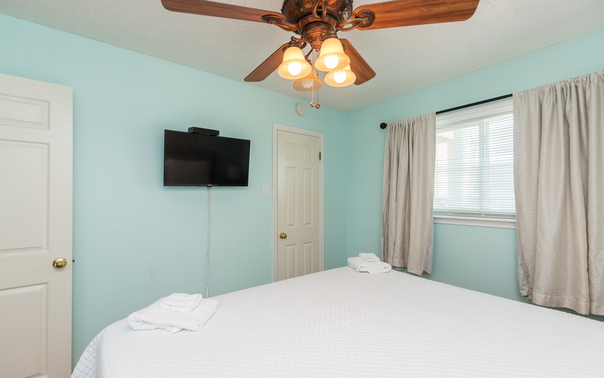 Unwind in your bedroom with a king size bed.