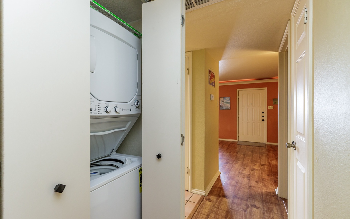 Your in-unit laundry closet keeps travel light with a stacked washer and dryer right in your home.