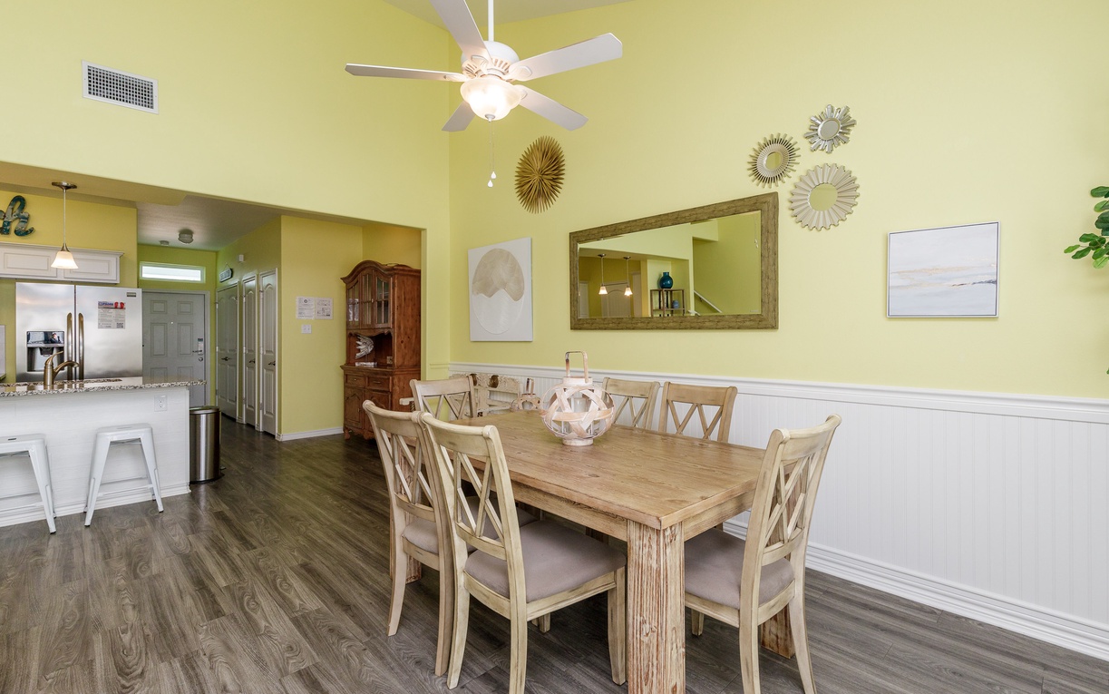 Gather around your spacious dining table for memorable meals with family and friends in this bright, cheerful space.