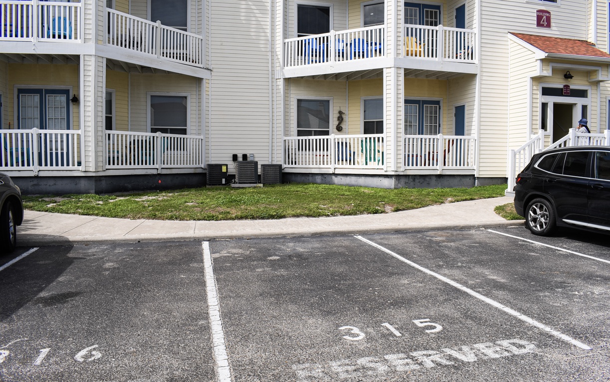 Convenient designated parking right outside the property building with easy access to your room.