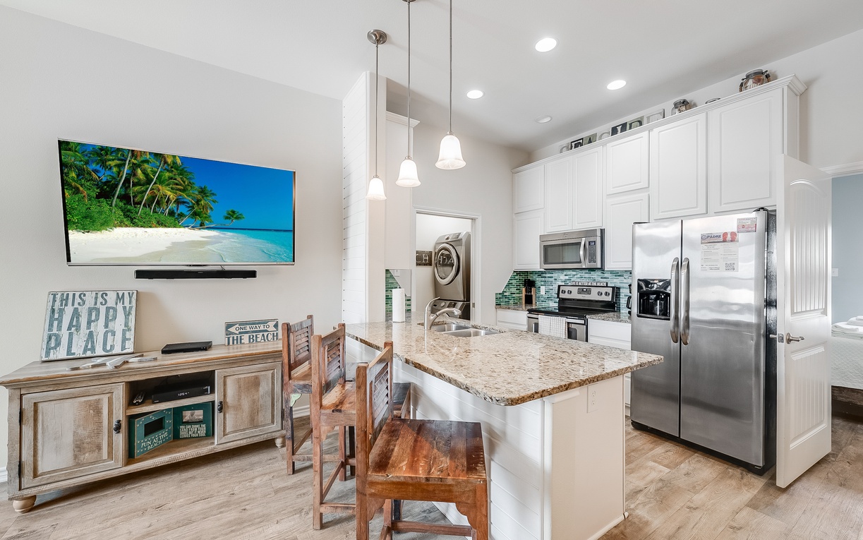 Your fully equipped kitchen and dining area blend comfort and style, perfect for preparing meals and enjoying quality time together.