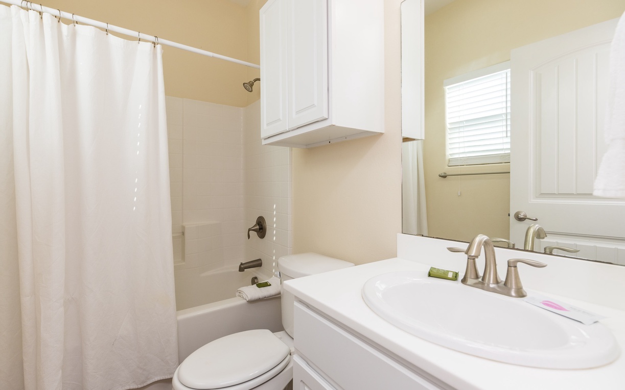 Your private bathroom offers everything you need to refresh after a day of adventure, with a spacious tub perfect for unwinding.