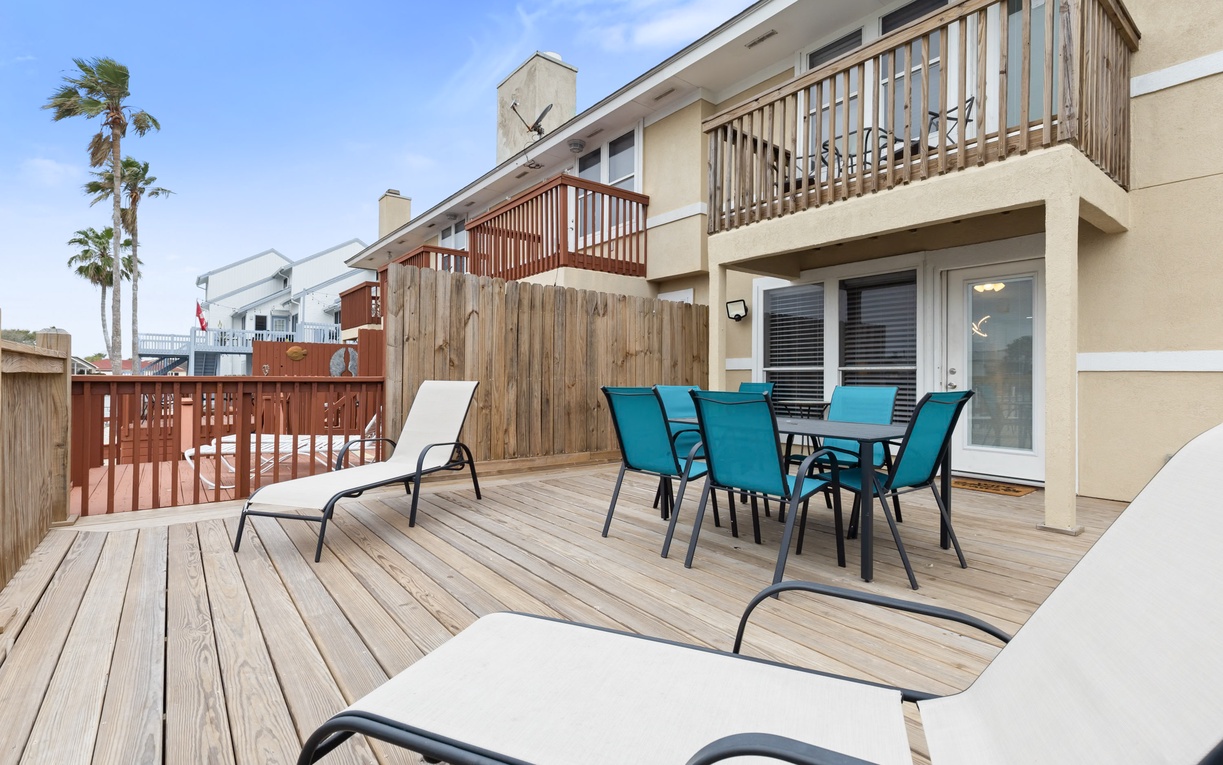 Soak up sunshine on your private deck with comfortable outdoor dining and lounge chairs, perfect for morning coffee or sunset gatherings.