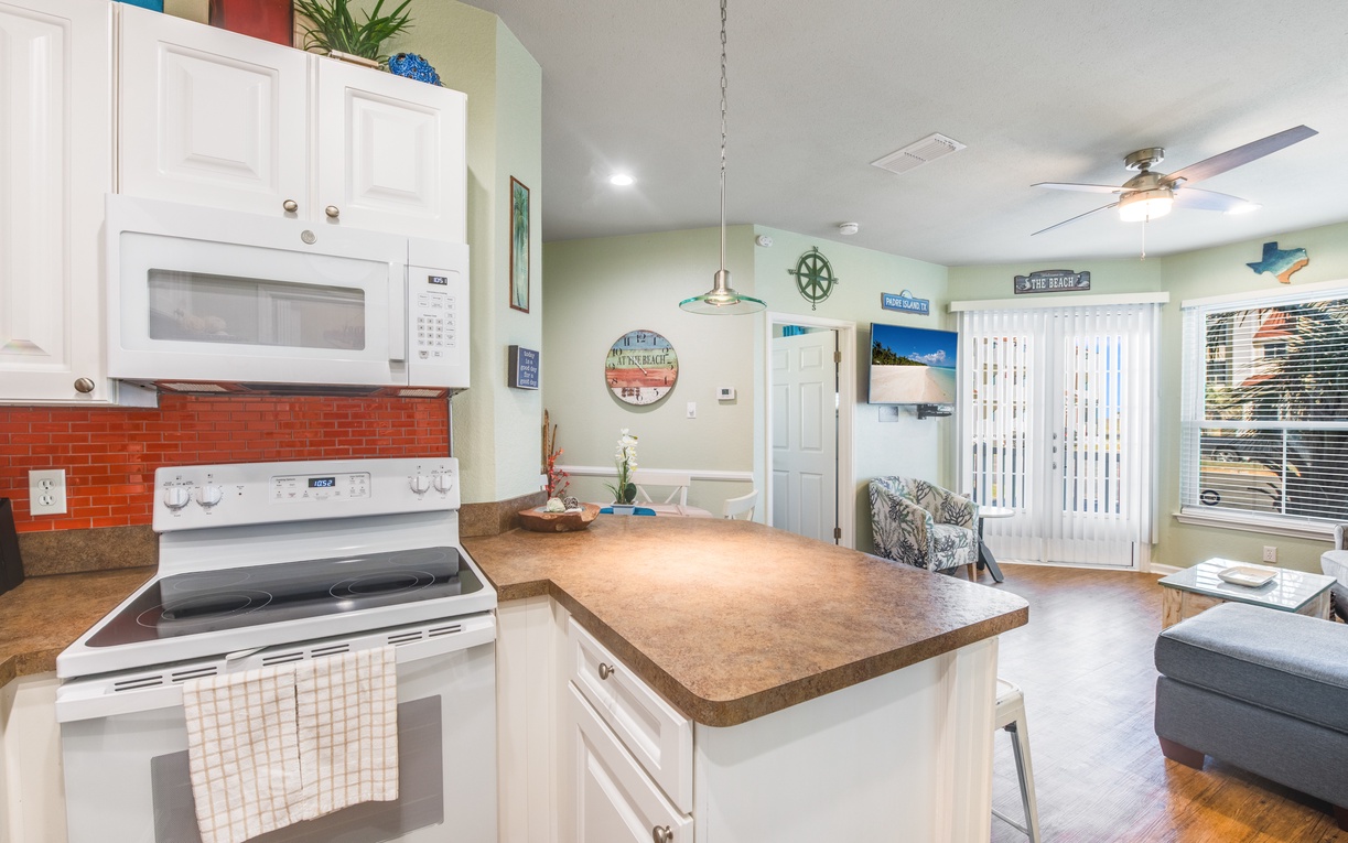 Your open kitchen flows seamlessly into the living area, perfect for cooking while staying connected with family and friends.
