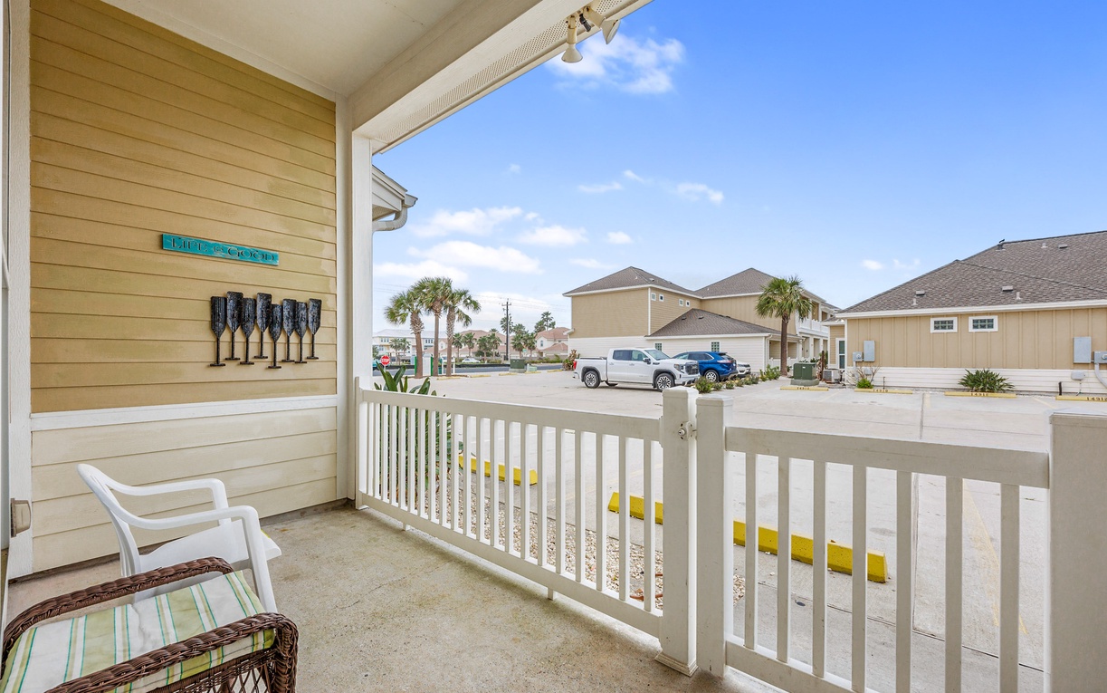 Your private balcony offers a peaceful spot to unwind with morning coffee while enjoying the coastal breeze and neighborhood views.