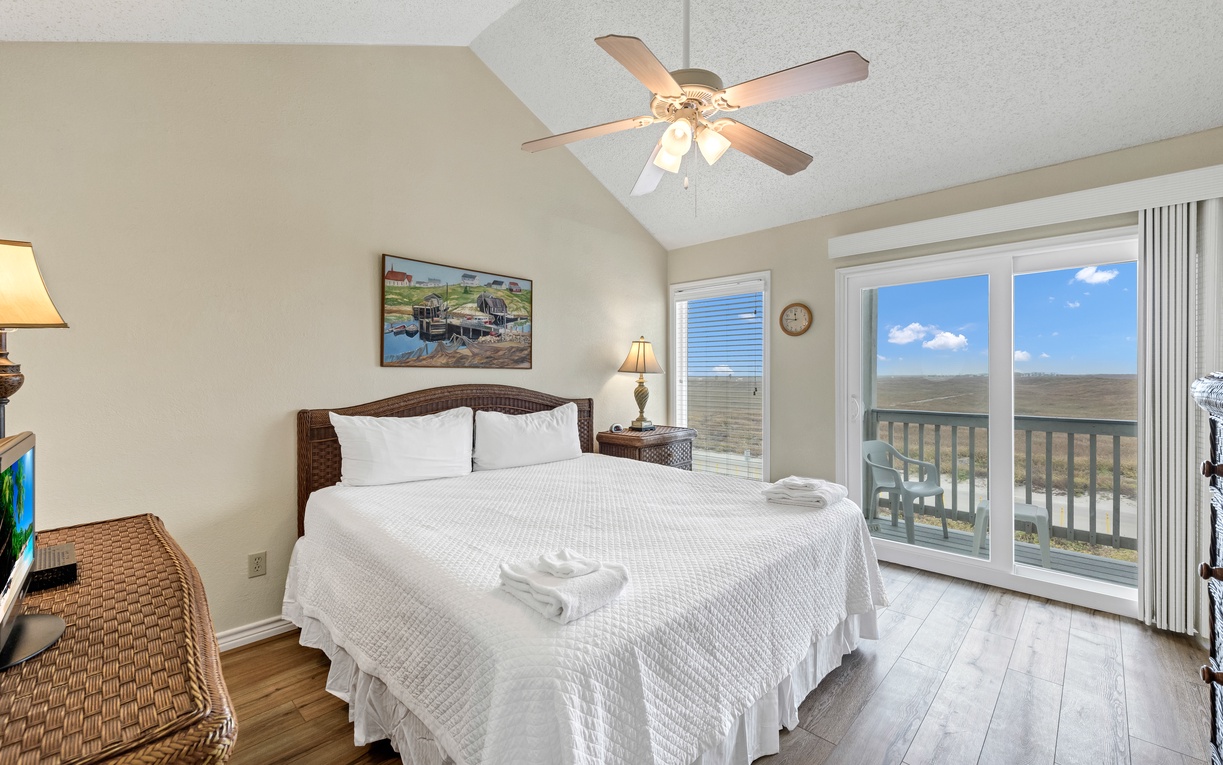 Wake up to stunning natural views from your comfortable bedroom with crisp linens and ocean-inspired decor.