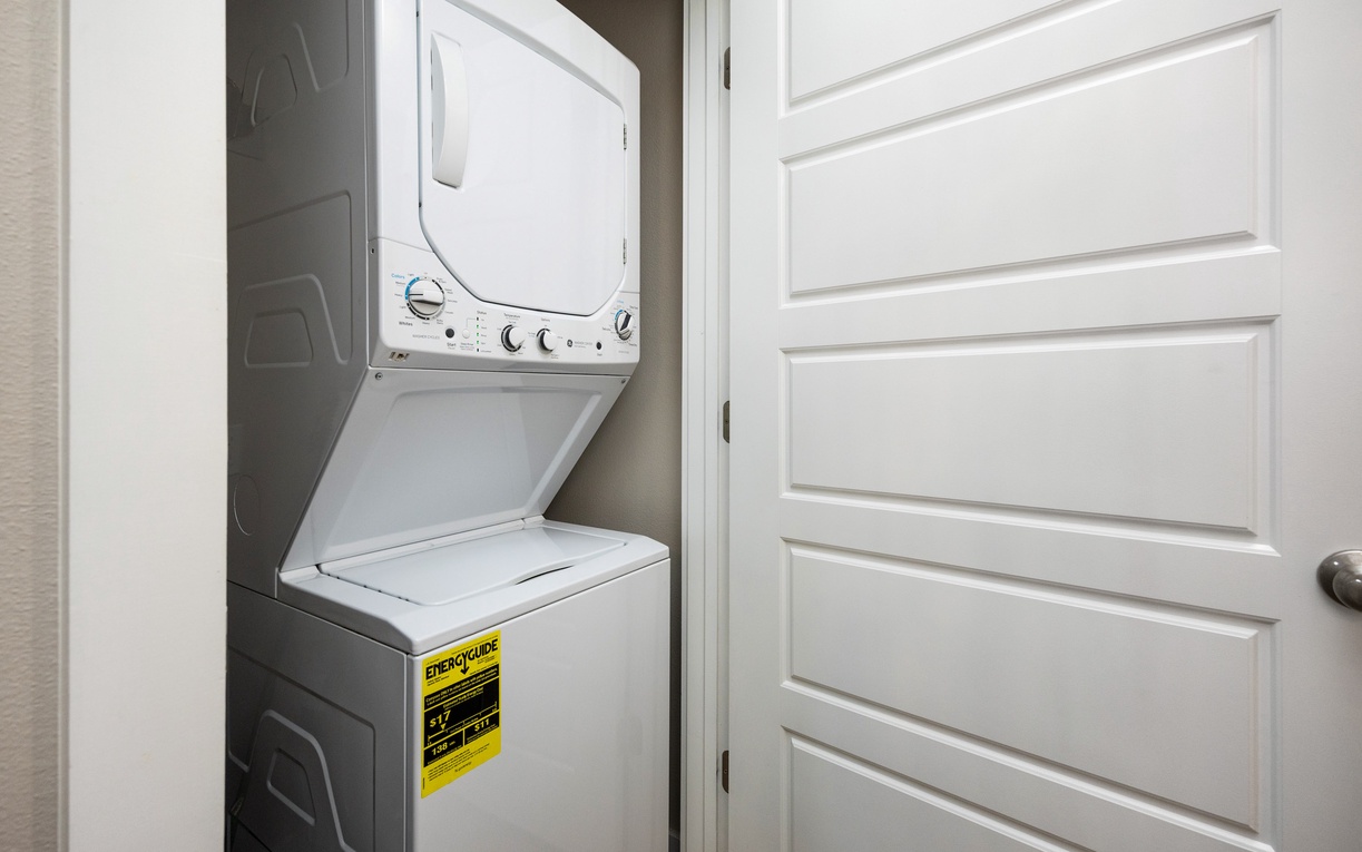 Your in-unit washer and dryer make packing light effortless, tucked neatly behind a stylish door for convenience.