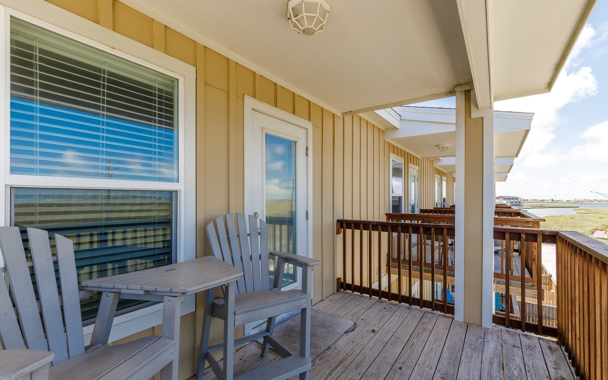 Step onto your private deck and settle into comfortable chairs while taking in peaceful views of the surrounding landscape.
