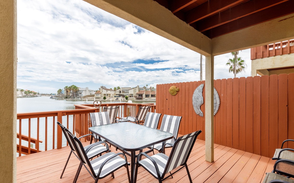 Savor morning coffee on your private waterfront deck, where canal views and gentle breezes create the perfect setting for relaxation.