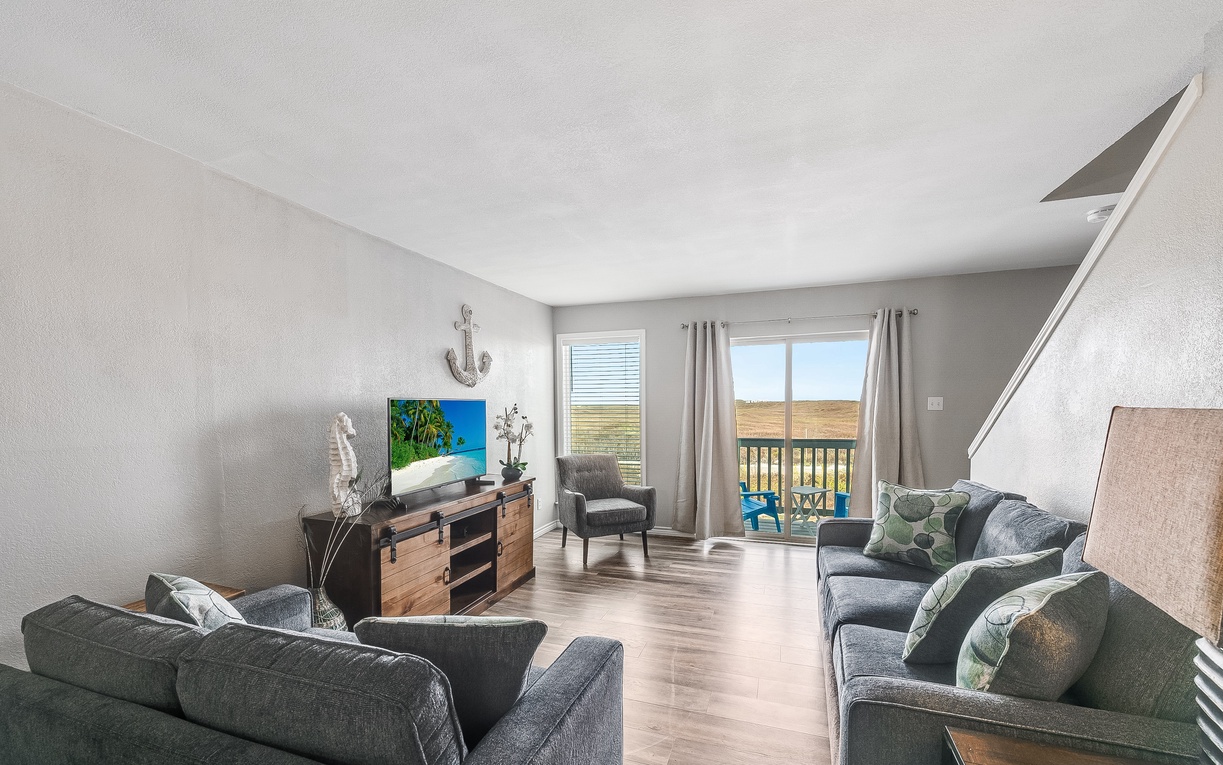 Sink into plush sofas and enjoy your morning coffee while taking in stunning views through floor-to-ceiling windows.