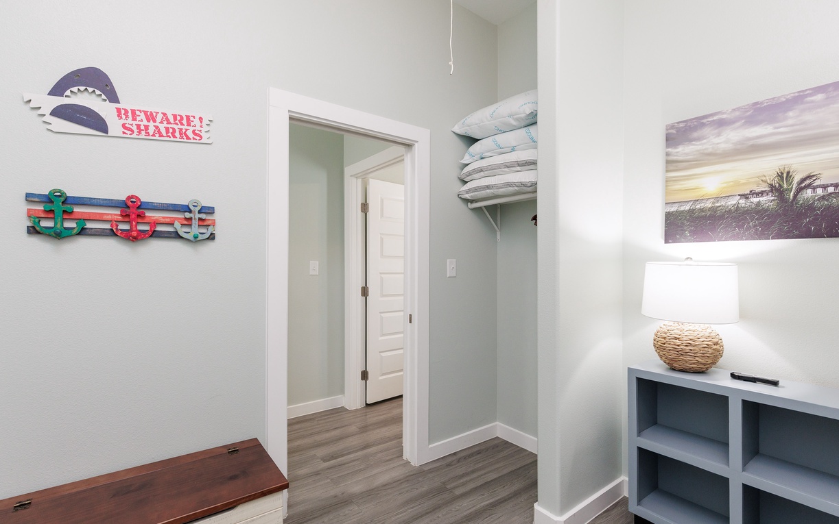 Your home base features coastal charm with beach artwork, organized storage, and thoughtful touches that make settling in effortless.