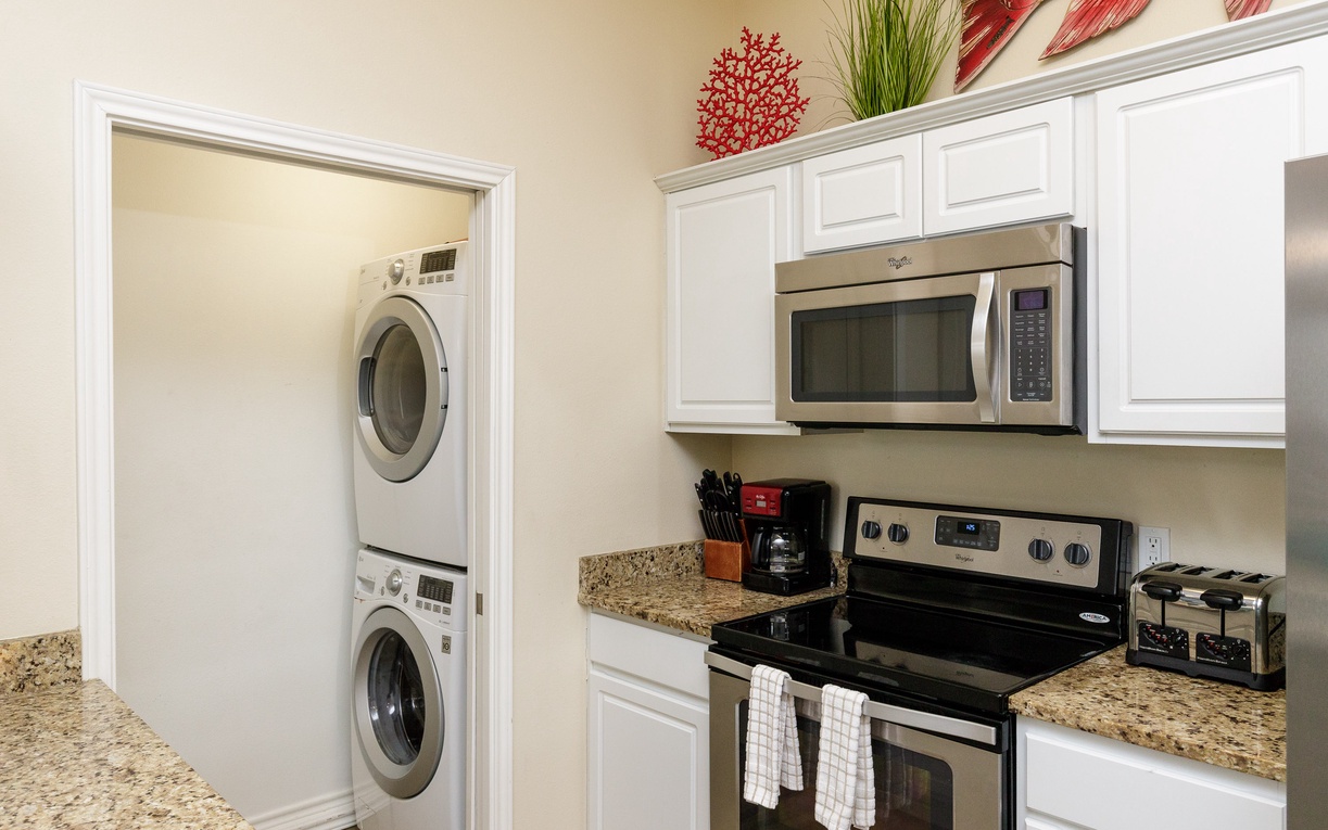 Your fully equipped kitchen features granite countertops, stainless appliances, and convenient in-unit laundry for ultimate comfort.