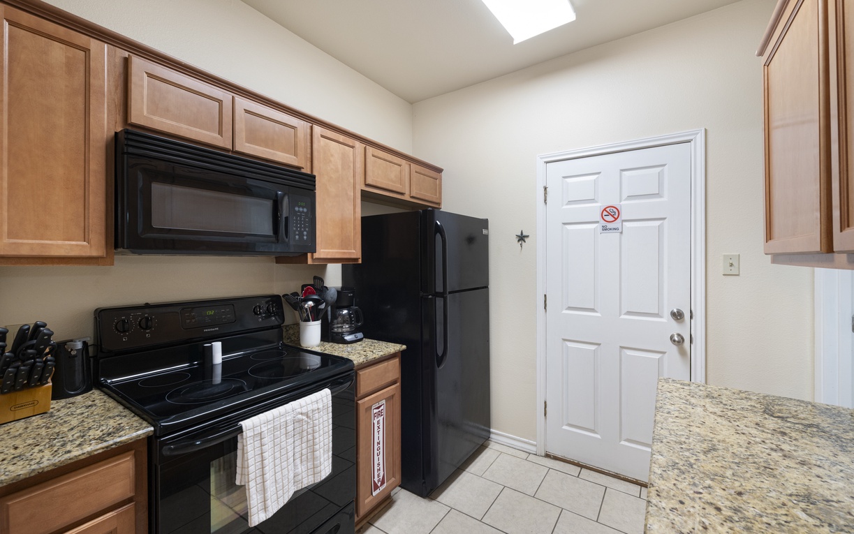 Your fully equipped kitchen features modern appliances, granite countertops, and plenty of cabinet space—everything you need to prepare delicious meals during your stay.