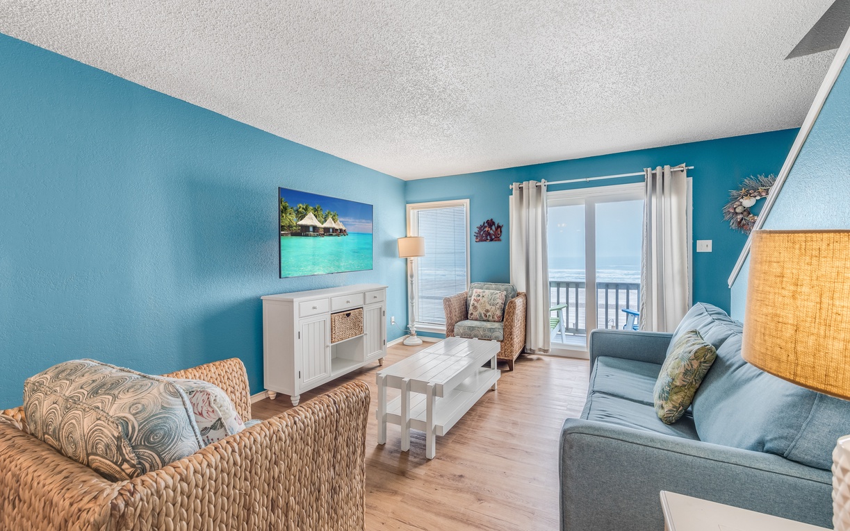 Sink into your coastal haven with ocean-blue walls and natural textures that instantly transport you to paradise.