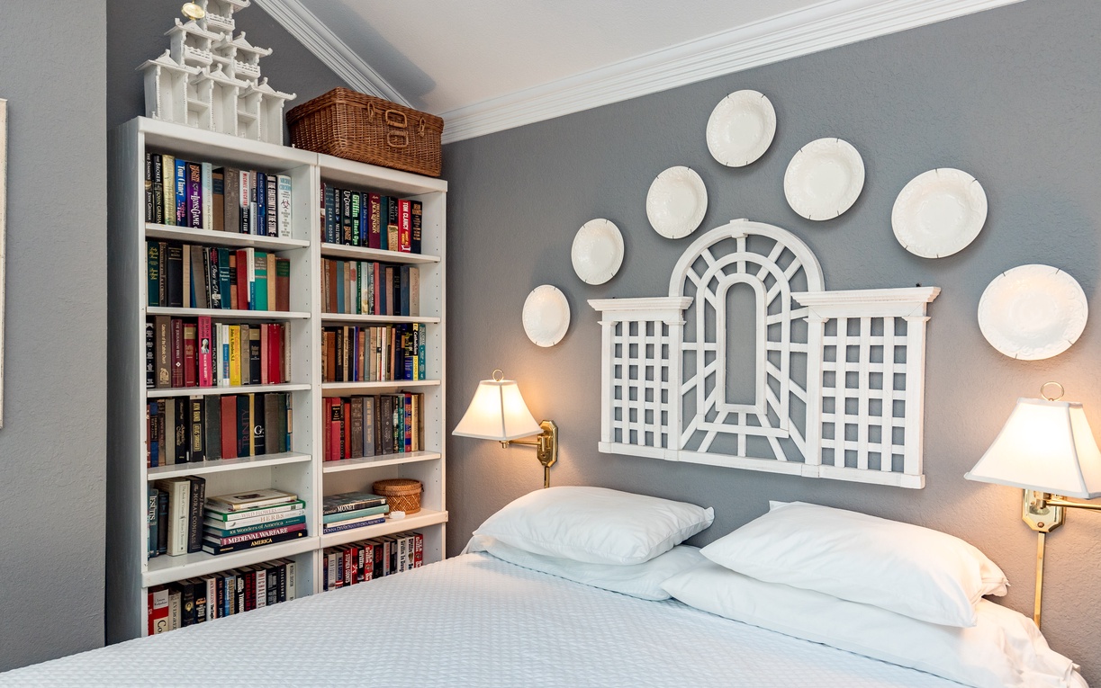 Drift off surrounded by books in your cozy reading retreat, where soft lighting and thoughtful decor create the perfect literary escape.