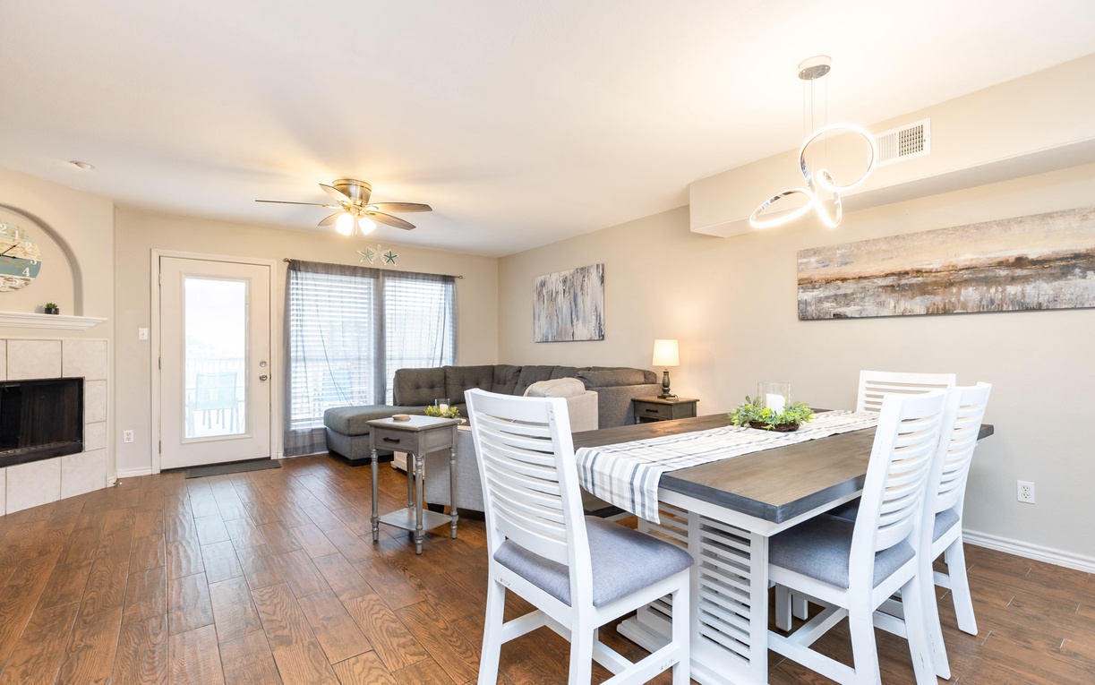 Step into your bright, open living space where modern comfort meets home. Gather around the dining table for meals or relax on the plush sectional.
