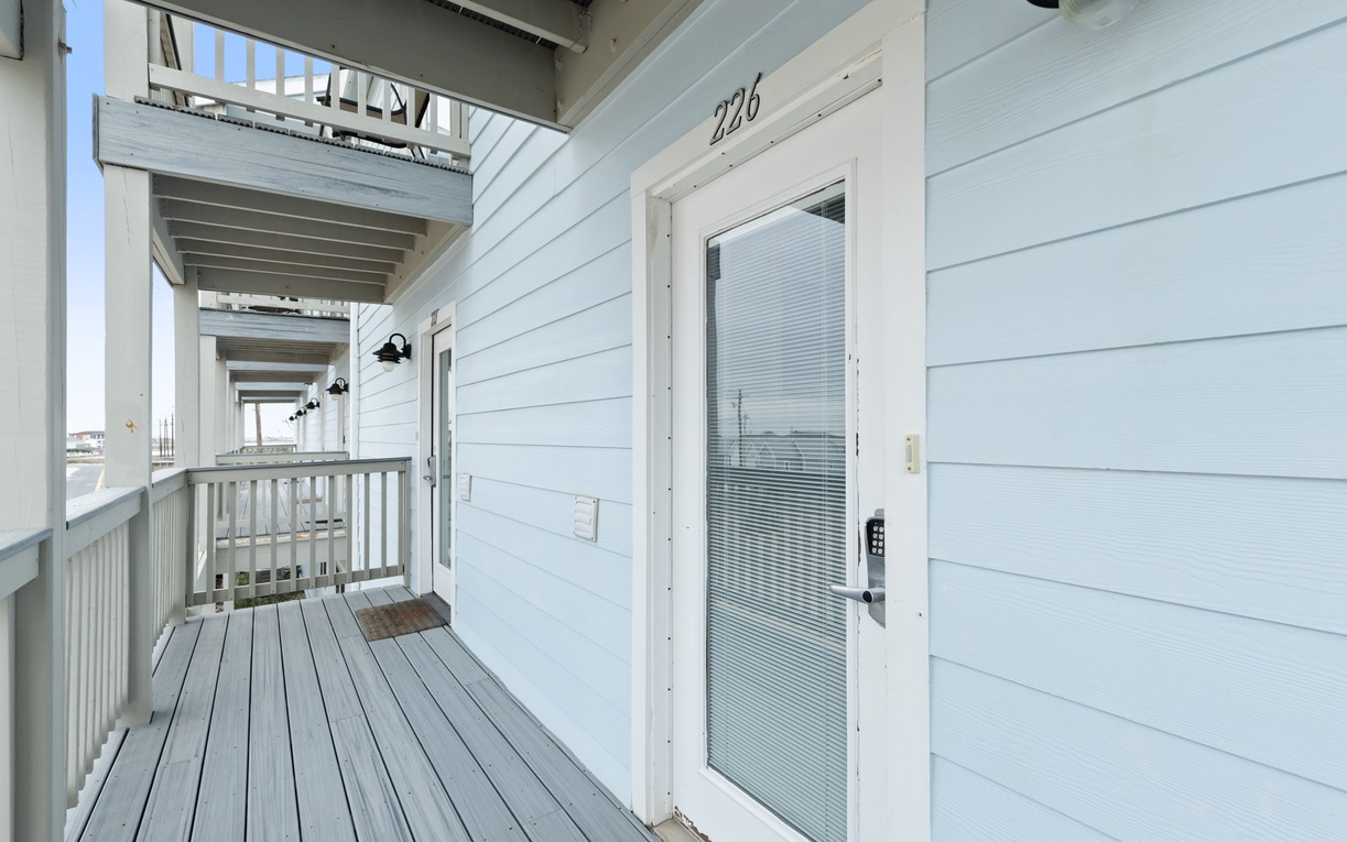 Fresh coastal charm welcomes you home—your private deck overlooks serene views, perfect for morning coffee or evening relaxation.