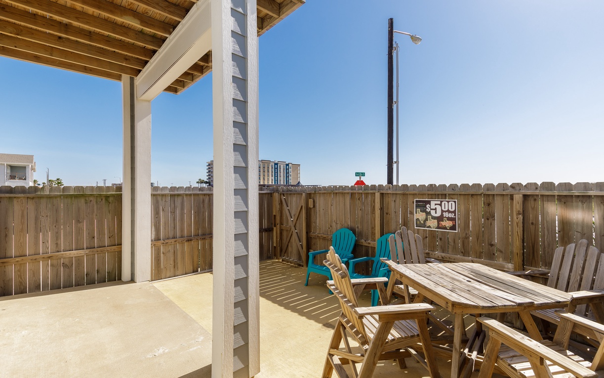 Your private patio offers the perfect outdoor retreat with comfortable seating and dining space for memorable meals under sunny skies.