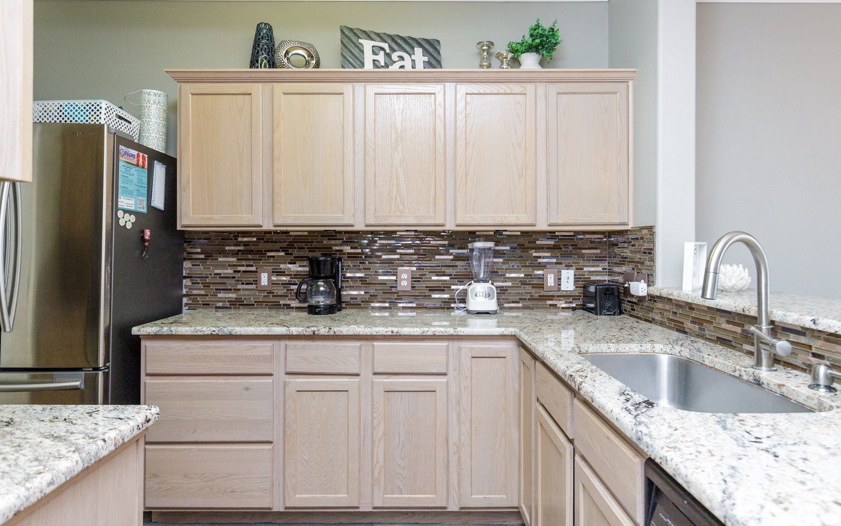 Your fully equipped kitchen features granite countertops, modern appliances, and everything you need to prepare meals during your stay.