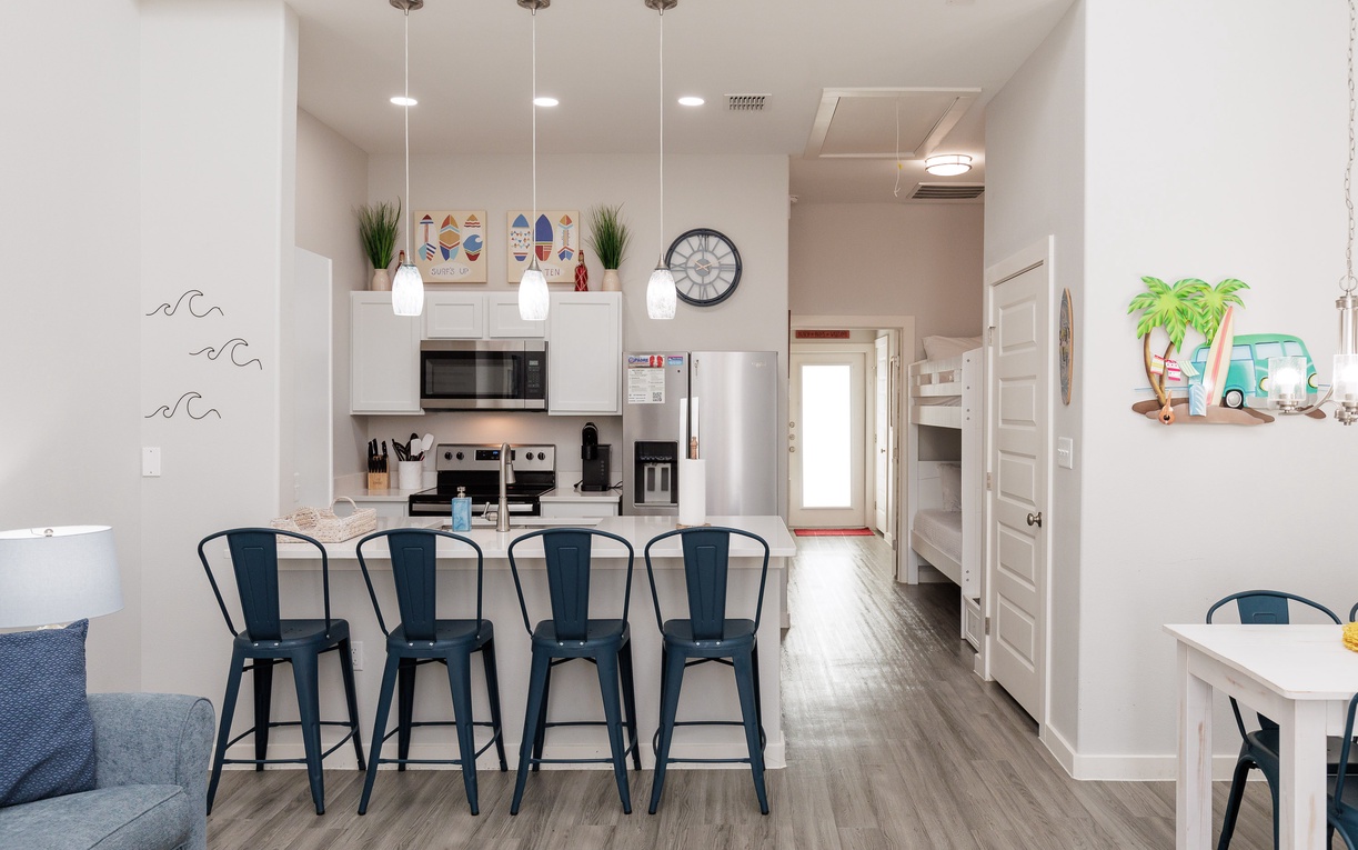Your bright, open kitchen features modern appliances and a breakfast bar where you can start each day together.
