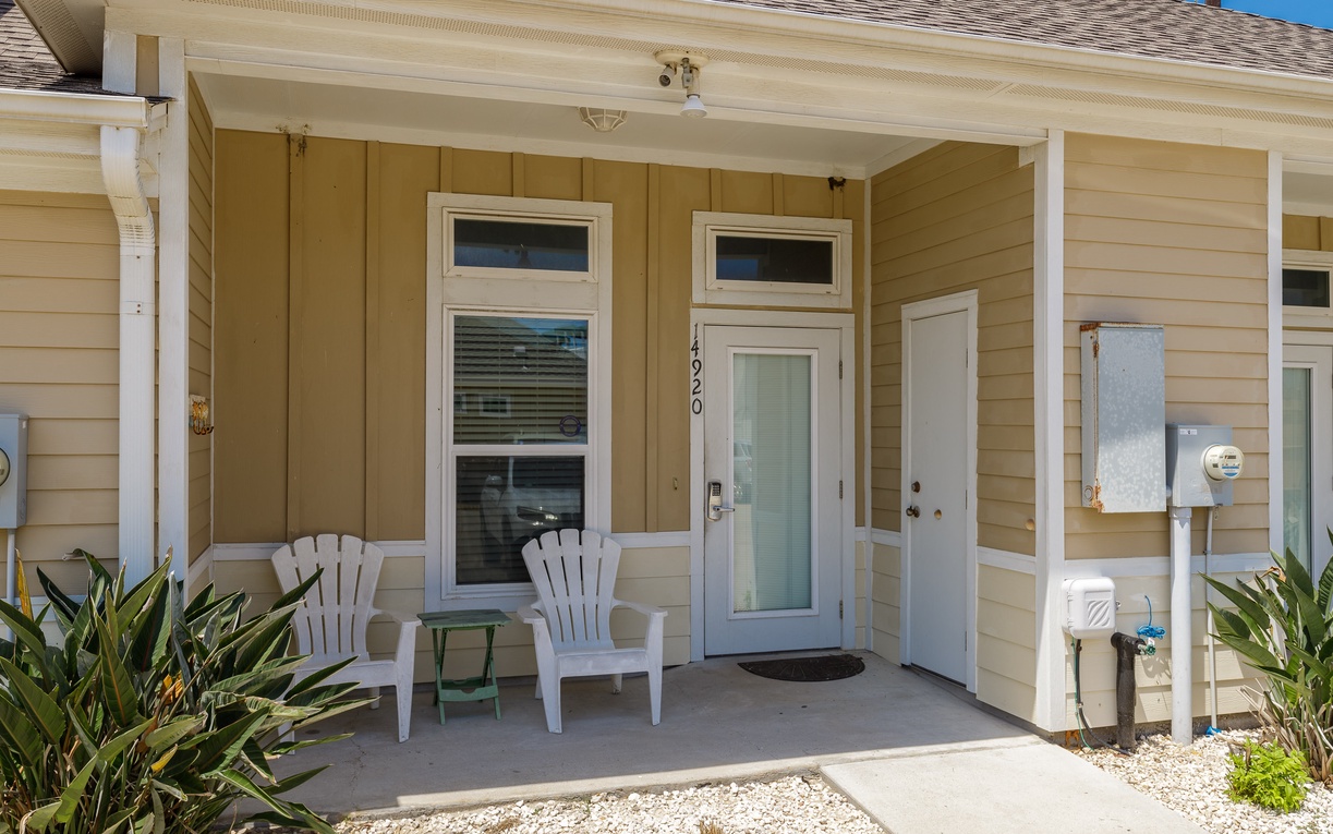 Welcome to your peaceful retreat! Relax on your private covered porch with comfortable seating, perfect for morning coffee or evening conversations.