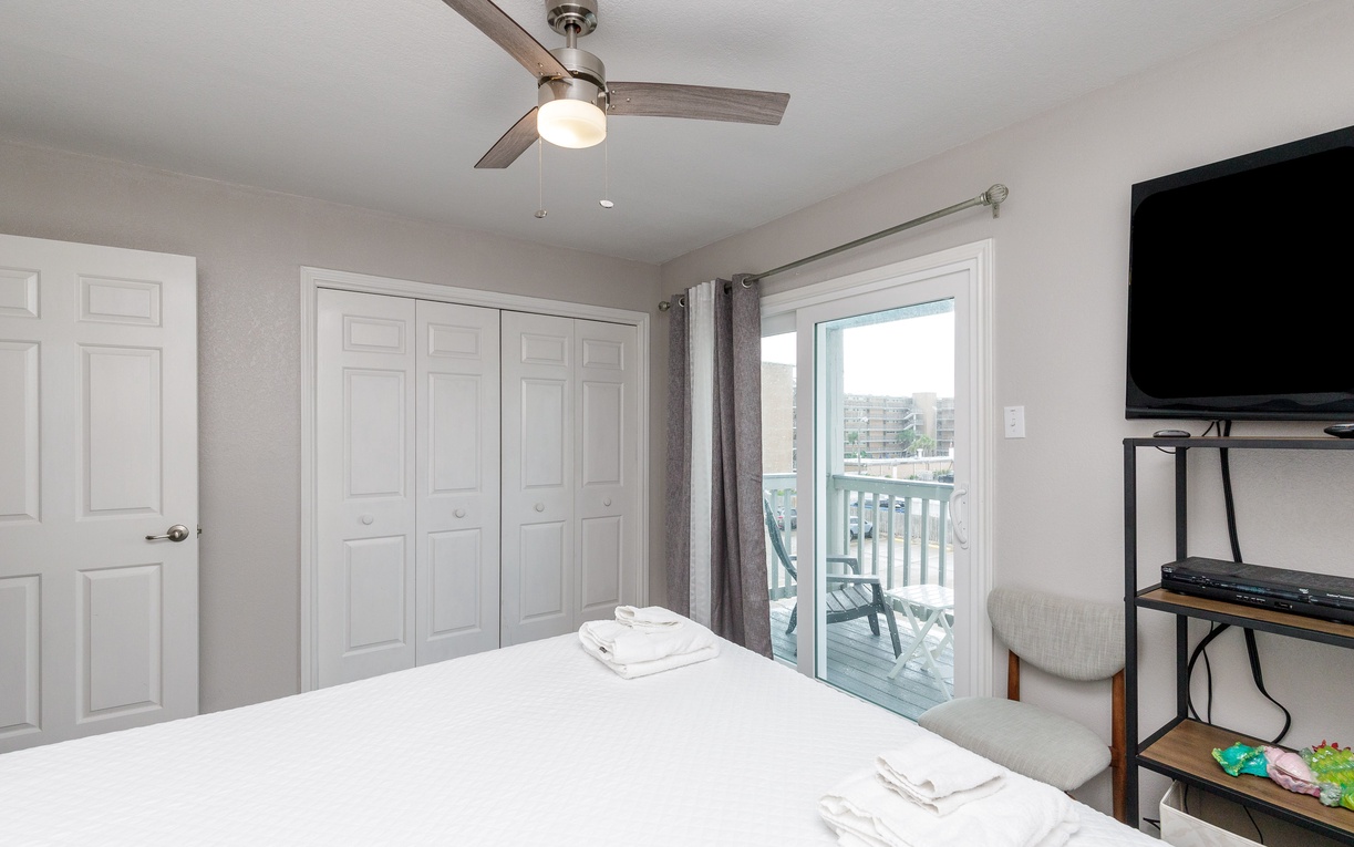 Relax in your bright bedroom with a private balcony where morning coffee and city views await.