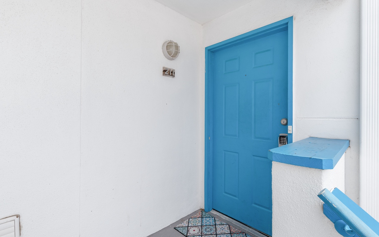 Front door with coded lock for added security.