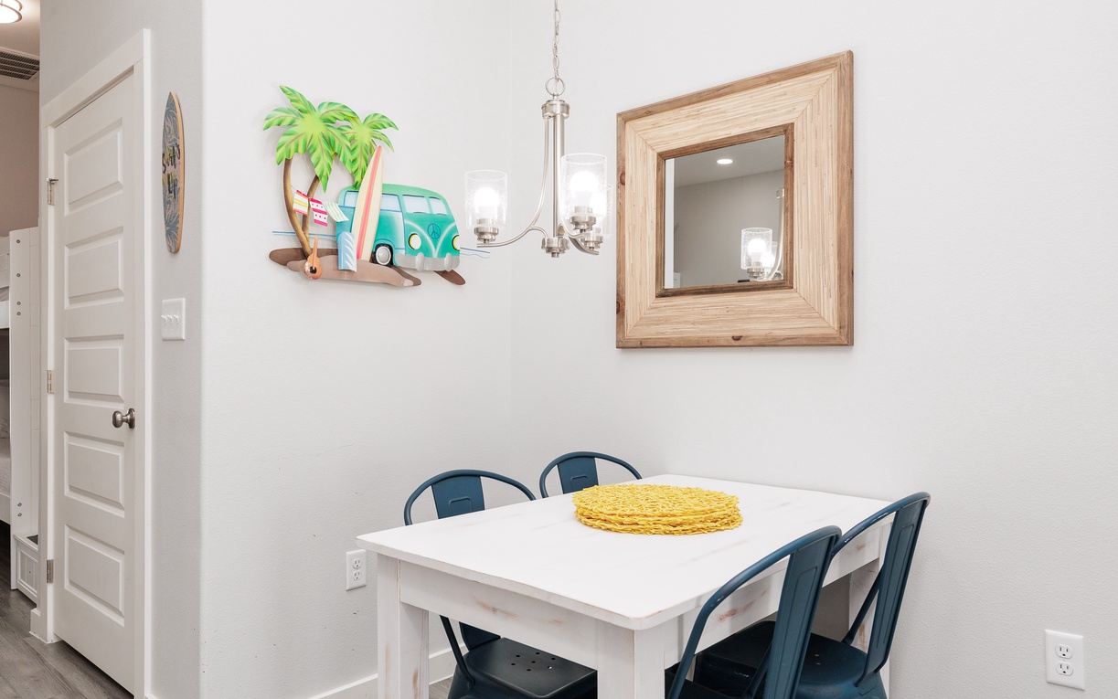 Your cozy dining space features charming beach-themed décor and comfortable seating for memorable meals together.