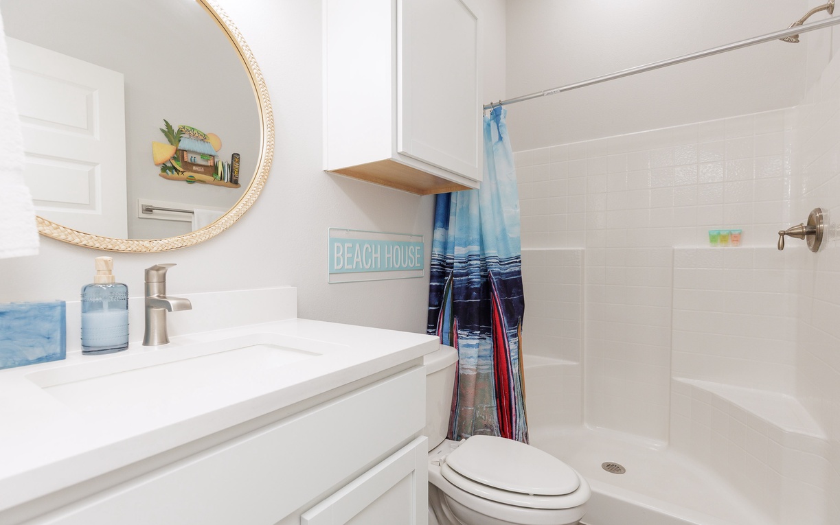 Refresh in your clean, bright bathroom with coastal touches that bring beachside vibes to your daily routine.