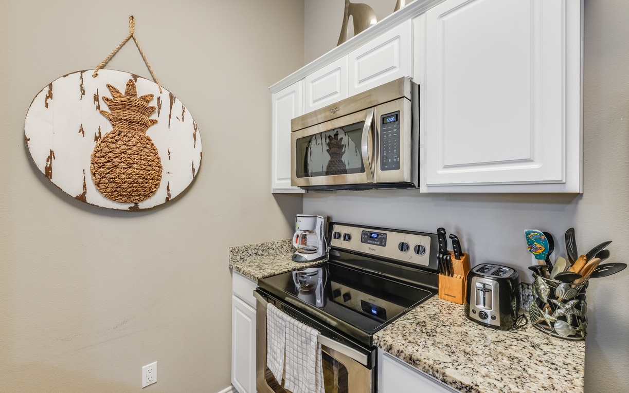 Your fully equipped kitchen makes meal prep a breeze with granite countertops, modern appliances, and thoughtful tropical touches that make you feel instantly at home.