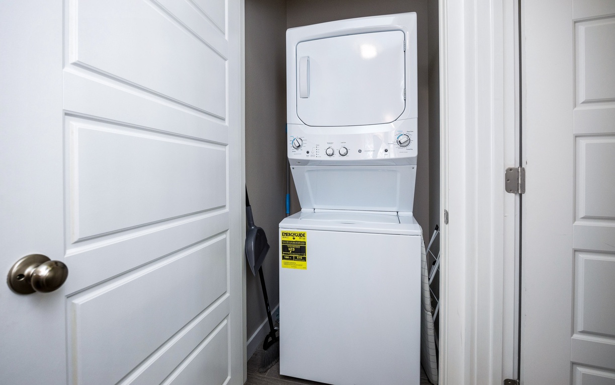 Your private laundry closet features a convenient stacked washer and dryer, making it easy to keep your clothes fresh throughout your stay.
