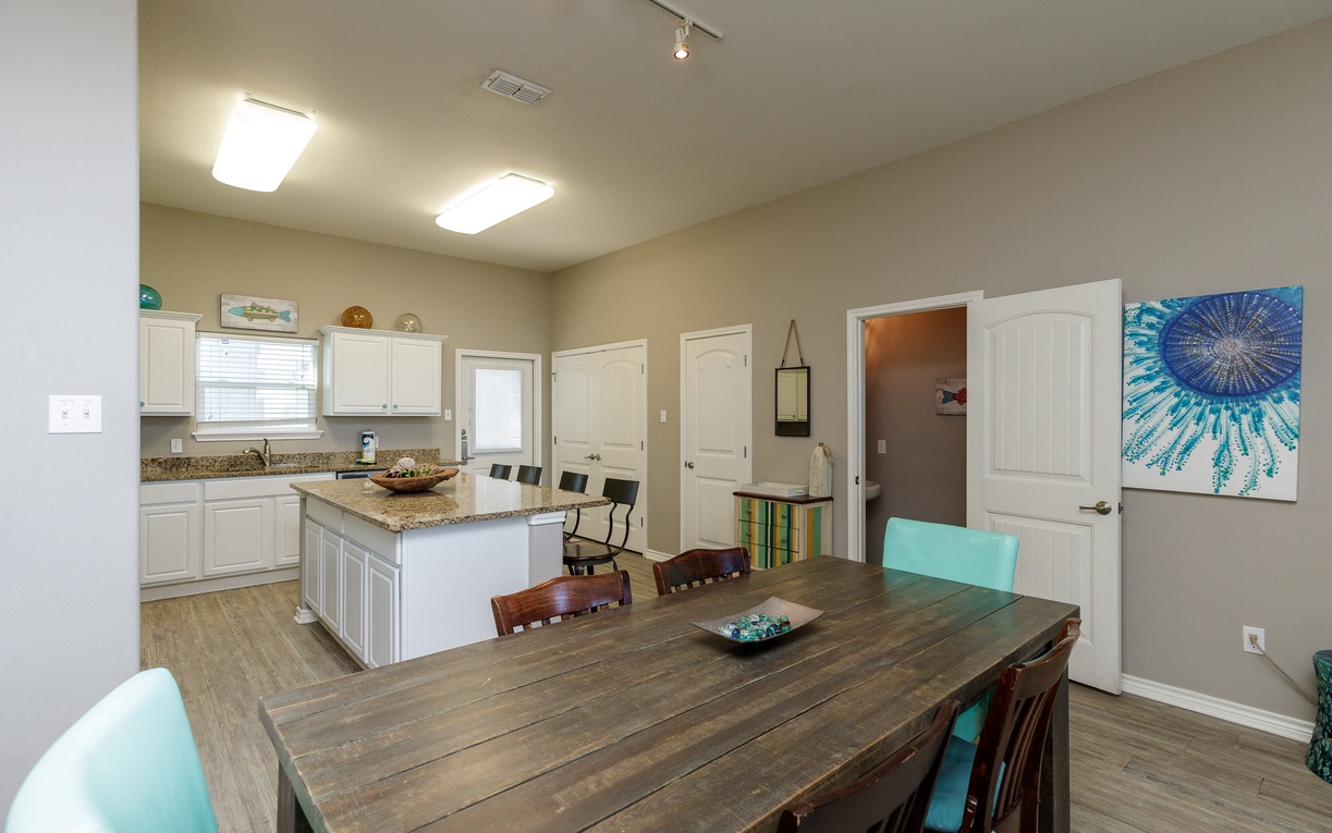 Your spacious kitchen and dining area features granite countertops, modern appliances, and comfortable seating for memorable meals together.