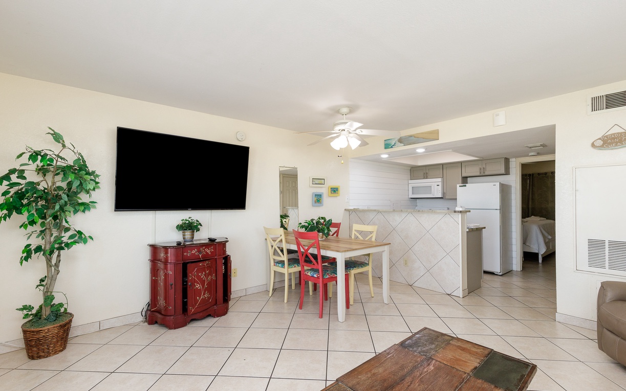Relax in your bright, open living space with dining area and well-equipped kitchen - perfect for memorable vacation meals together.