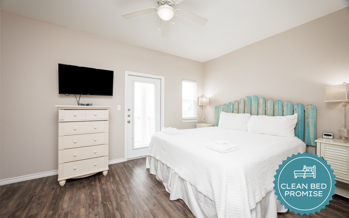 Unwind in your serene bedroom with coastal-inspired décor, crisp linens, and modern amenities for ultimate relaxation.