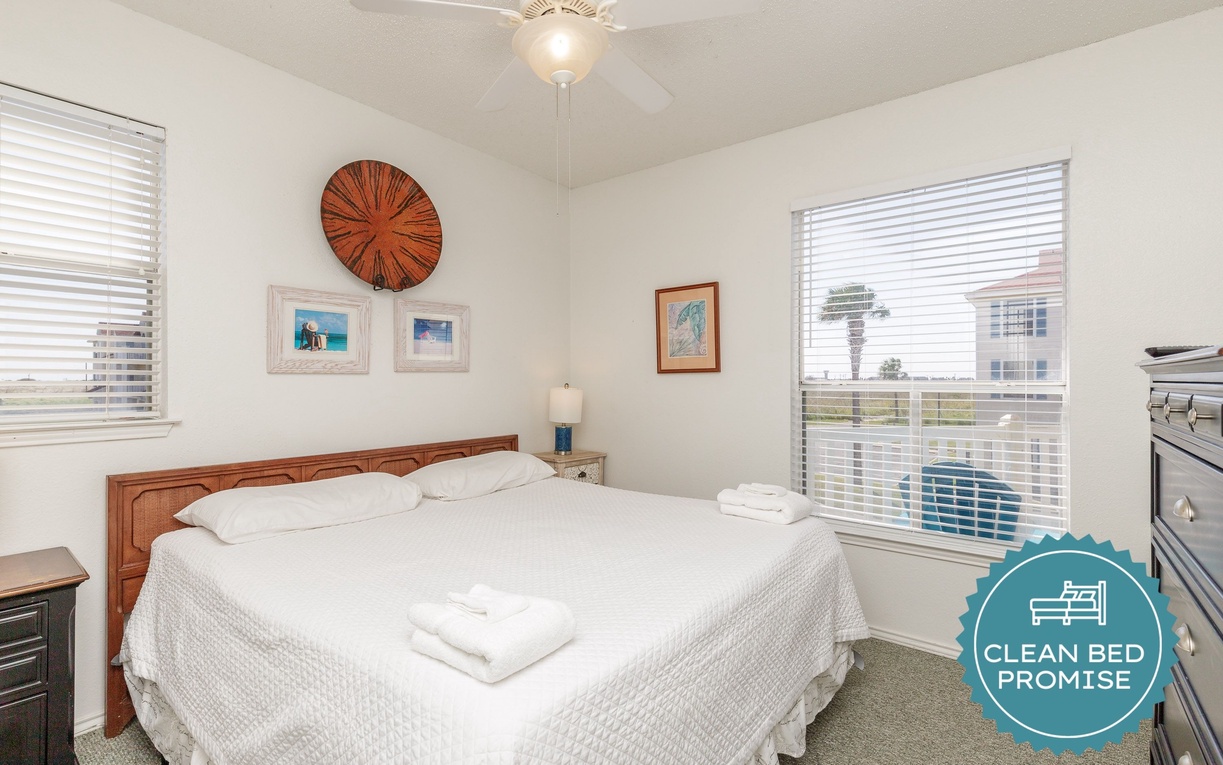 Wake up refreshed in your comfortable bedroom with tropical touches and city views from your window.