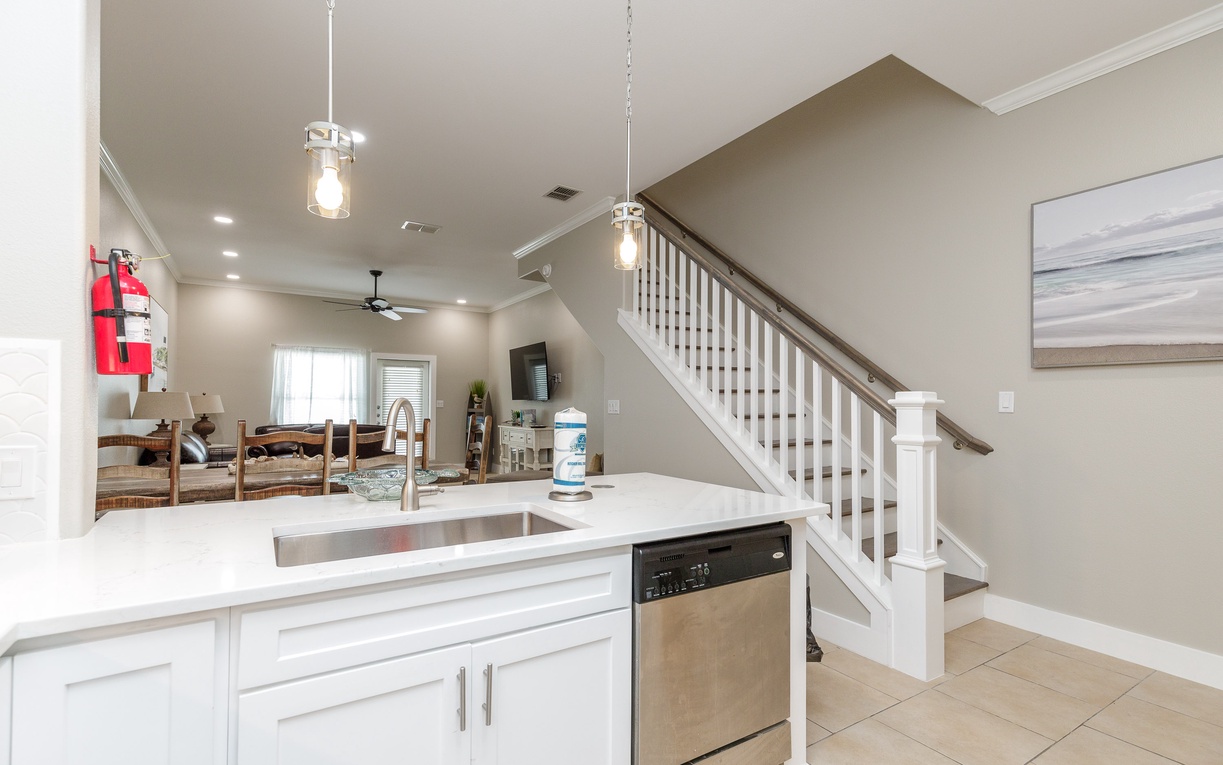 Your modern kitchen flows into a bright living space, perfect for gathering with family while you cook and entertain.