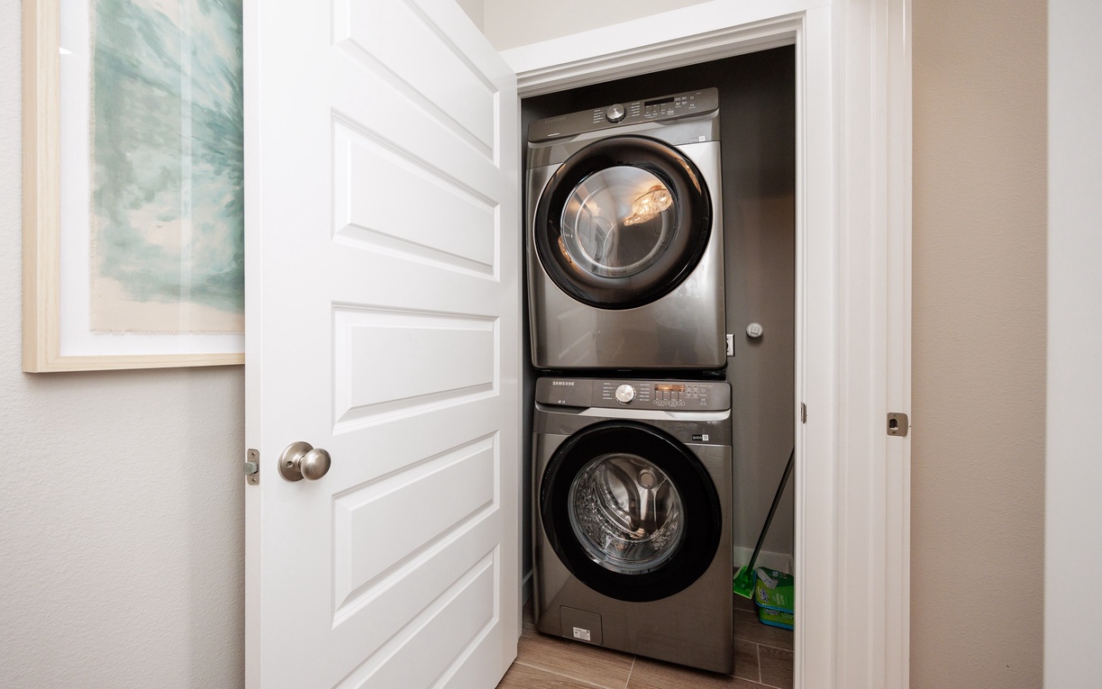 Keep your wardrobe fresh with in-unit stacked washer and dryer tucked neatly behind stylish doors for your convenience.