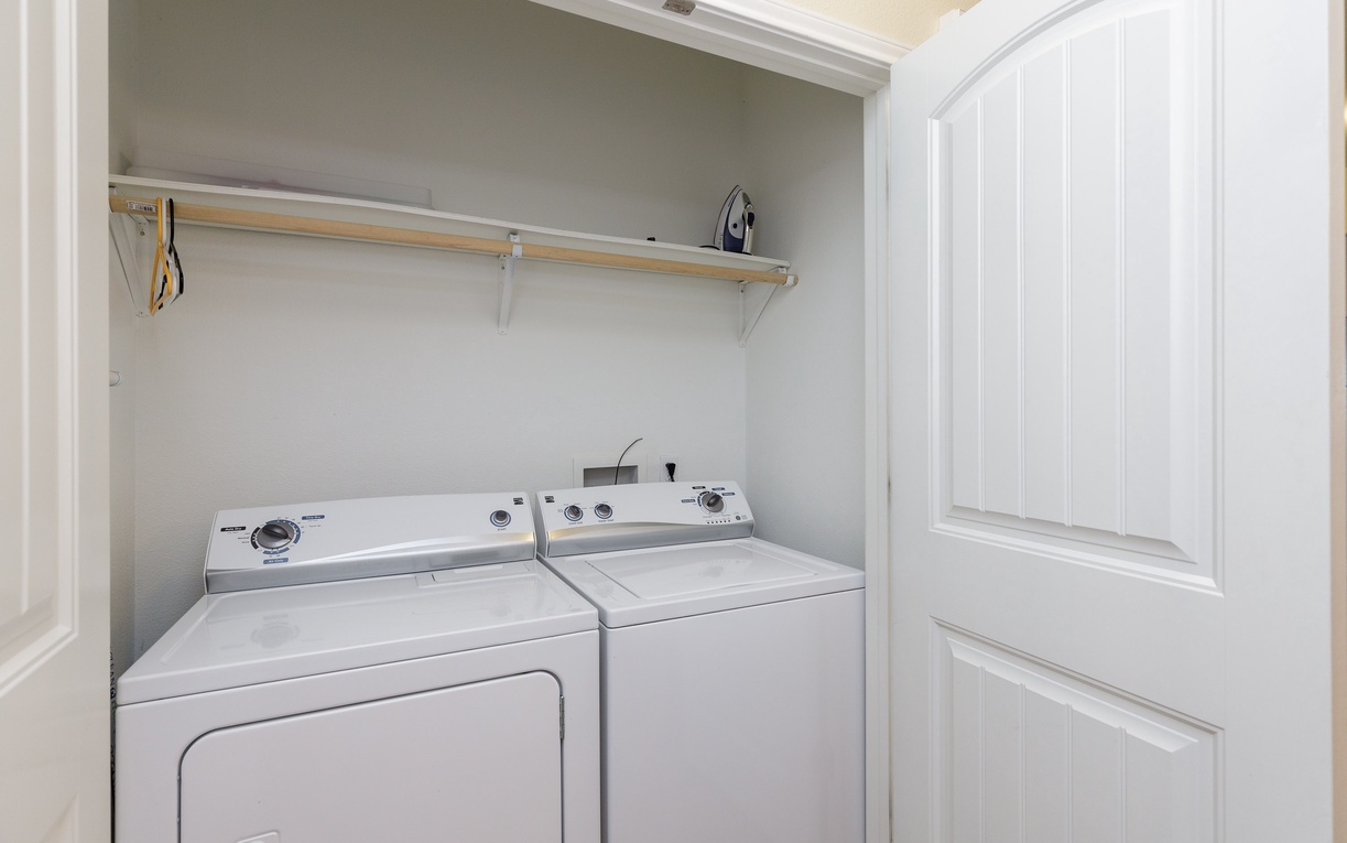 Your in-unit washer and dryer make extended stays effortless, with a convenient hanging rod for freshly pressed clothes.
