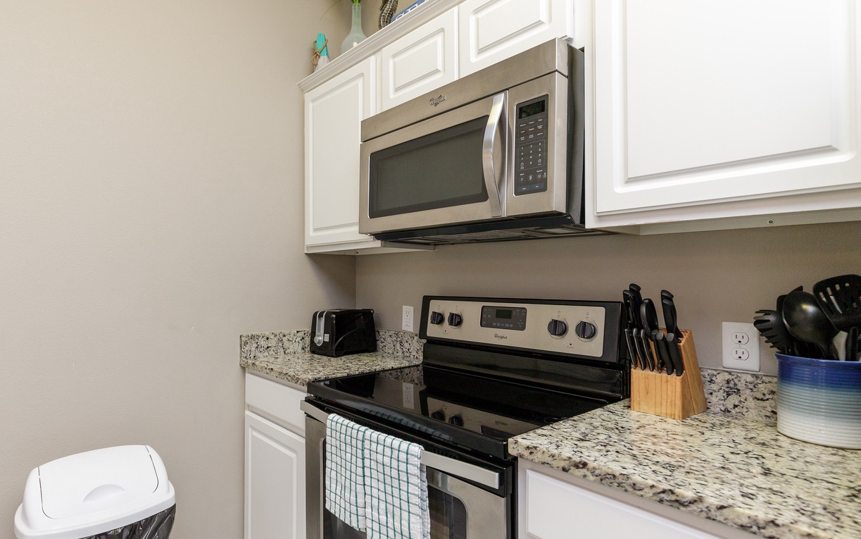 Your fully equipped kitchen awaits with granite counters, stainless appliances, and everything you need to create memorable meals during your stay.