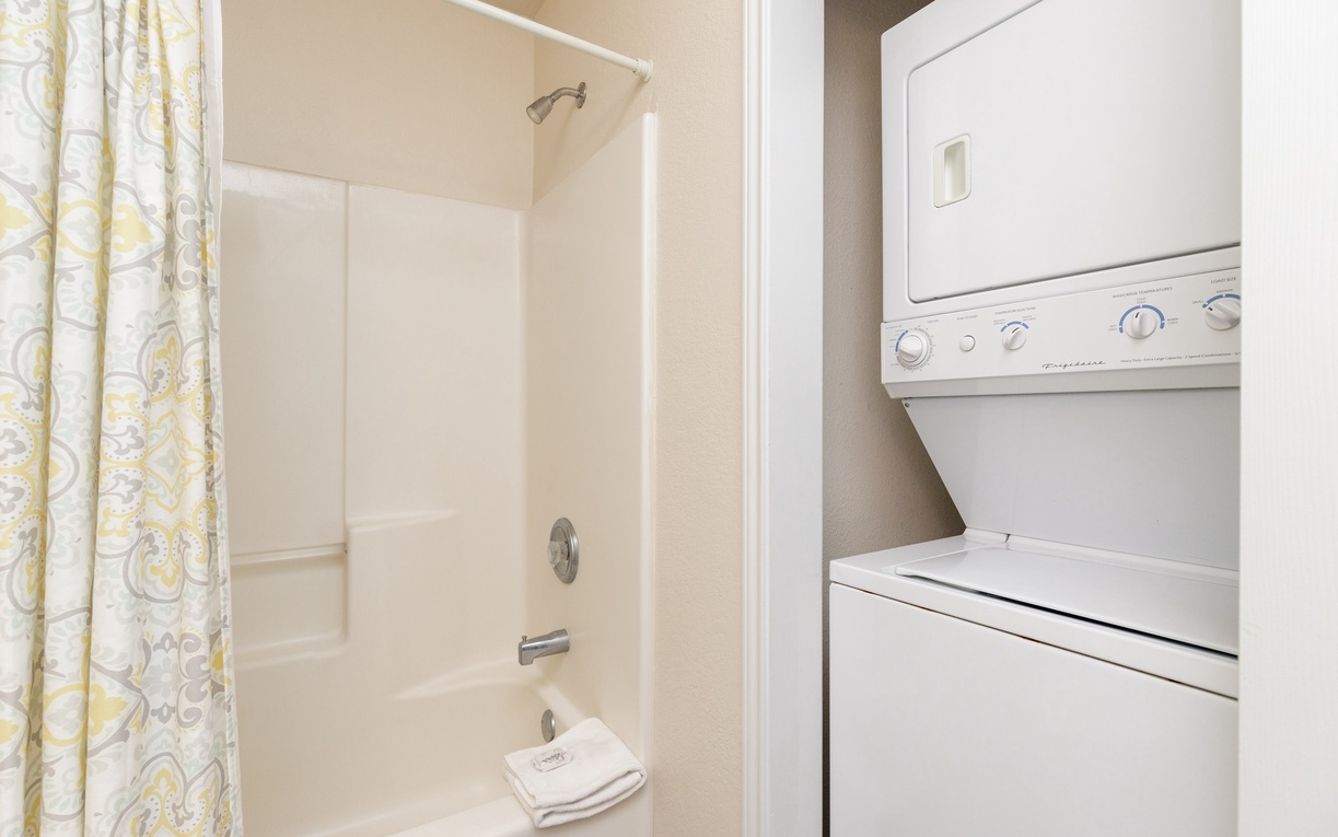 Your private bathroom features a full tub-shower combo with fresh towels, plus convenient in-unit washer and dryer for ultimate comfort.